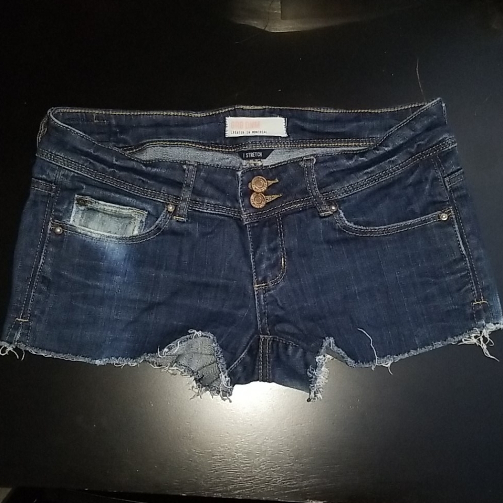 Frayed denim shorts.